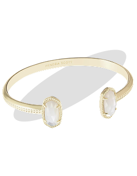 A gold cuff bracelet with gemstone accents